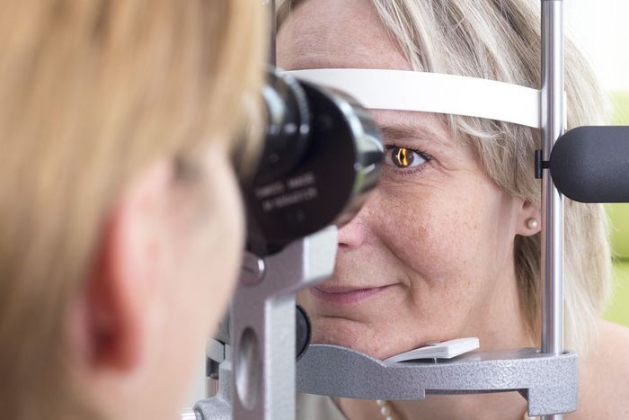 woman undergoing eye exam
