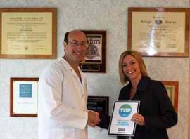 Dr. Wilderman Accepting a Top Dentists Award, Doylestown, PA